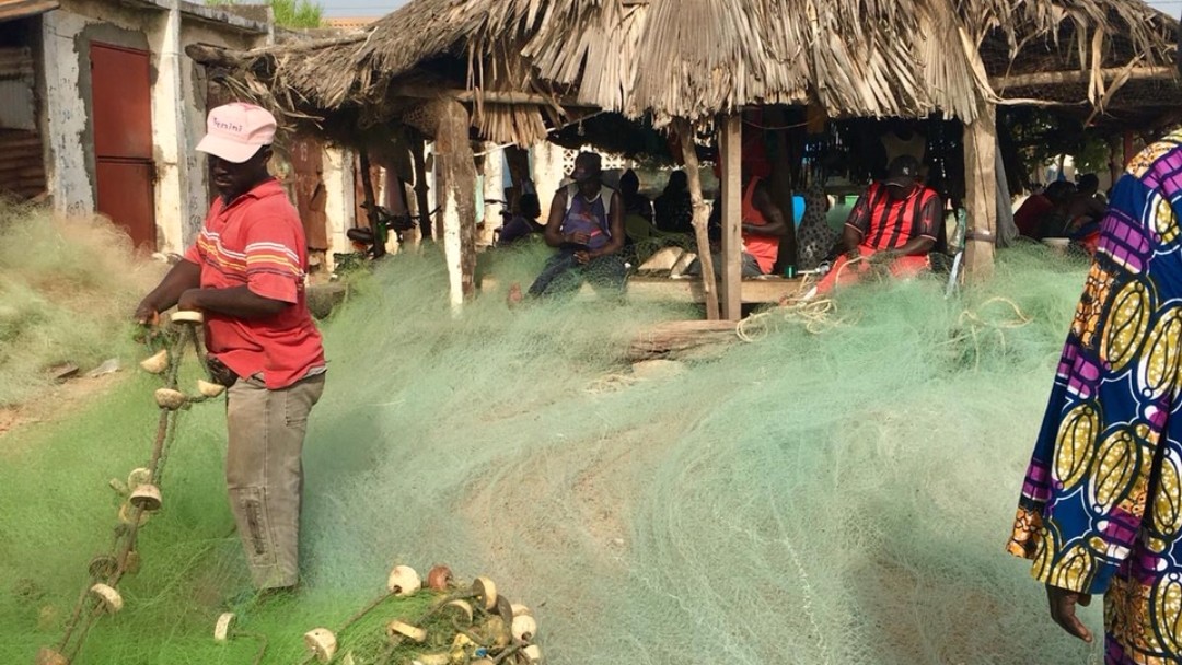 Fishermen at a beach in Bajul