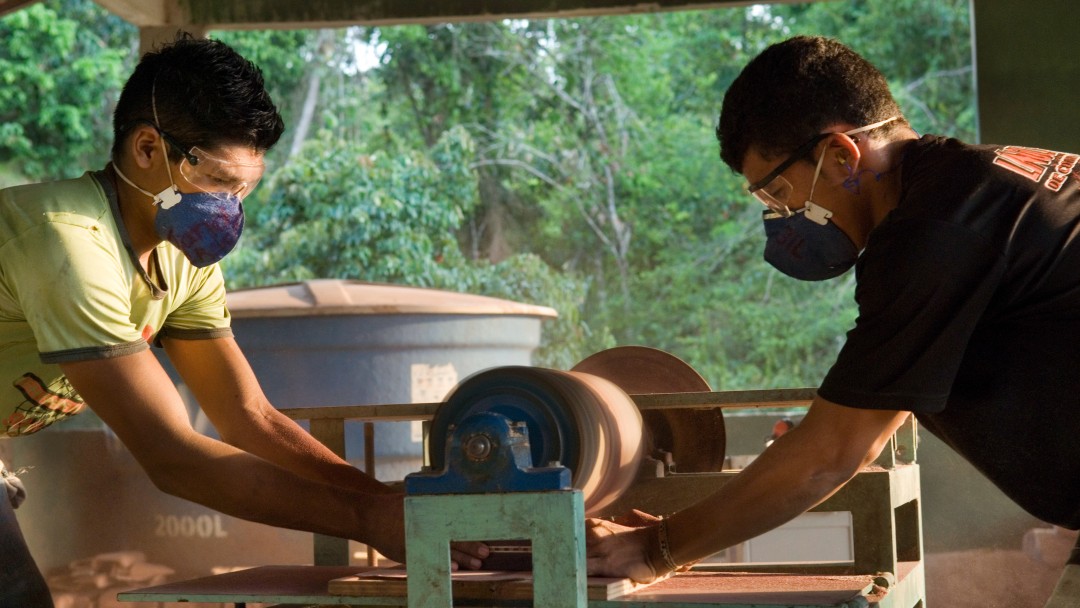  Two young men making handicrafts 