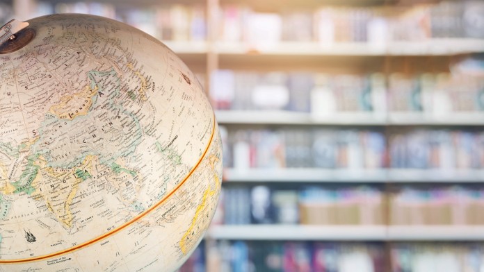 A globe with books 