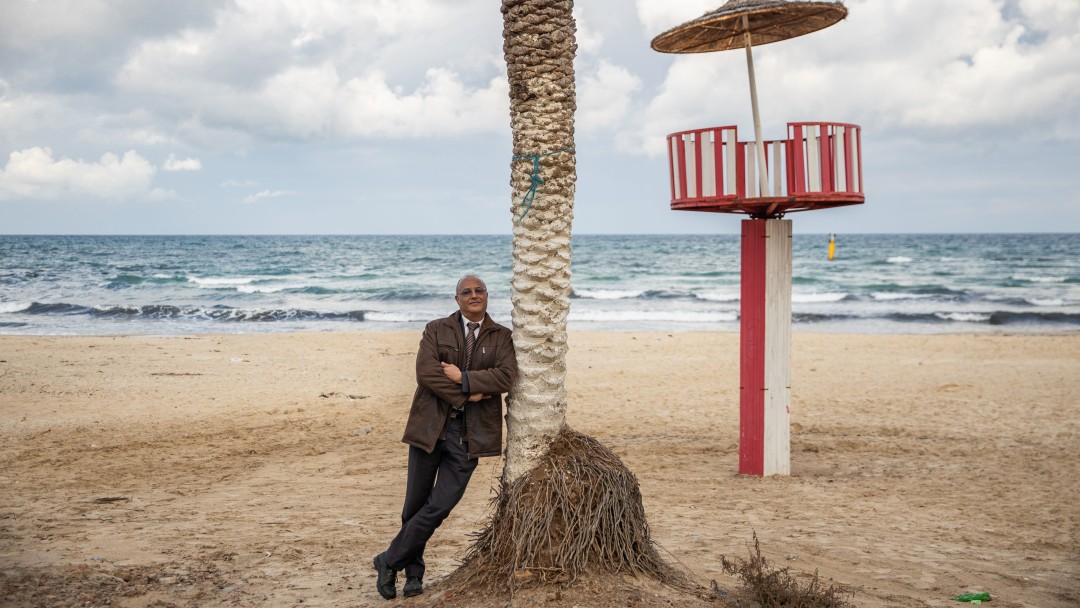 Man and coastline 