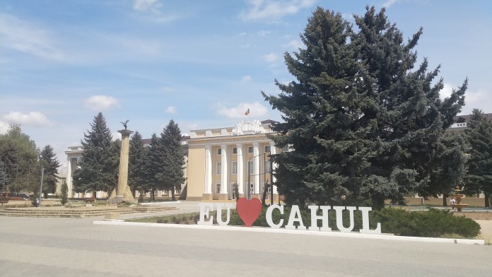 A midtown in Moldova with a sign saying 