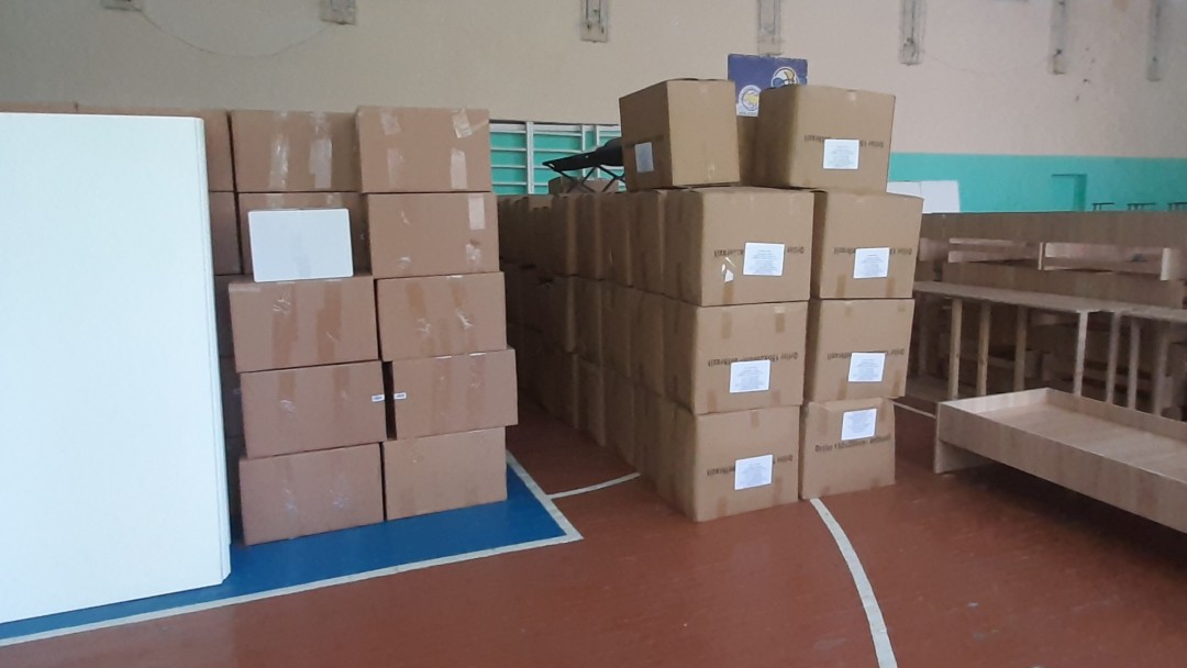 Classroom which is full of boxes