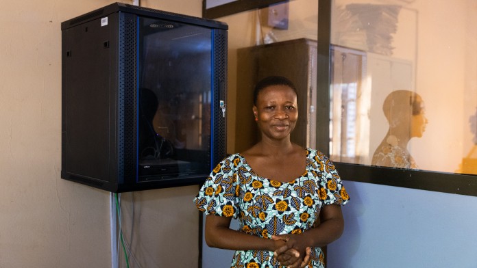 Woman in front of a router