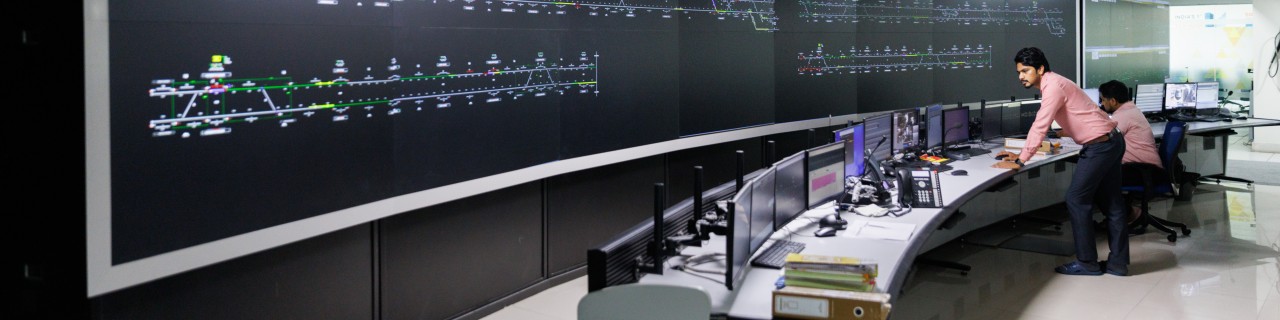 Two men in the metro traffic control centre