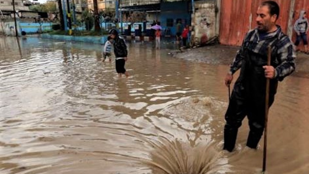 Masses of water in front of a market