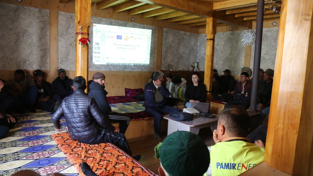Representatives of Pamir Energy and affected residents at a public hearing.