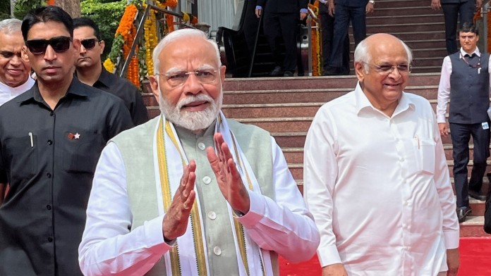 Indian prime minister infront of a metro station.