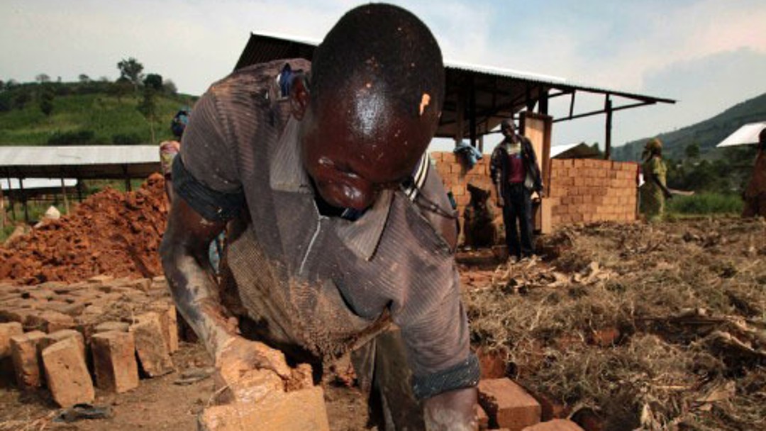 A man is making bricks
