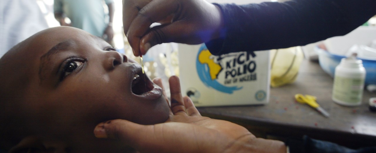 A child receives a vaccination against polio