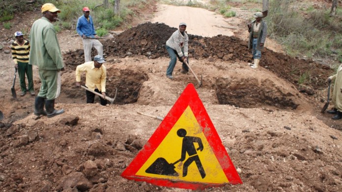 Road construction works on a street in Africa