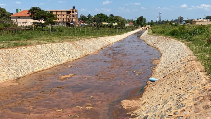 The newly constructed drainage channels protect the residential areas from flooding.