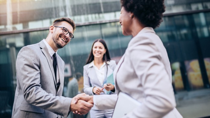 Two people shaking hands