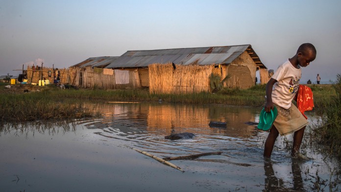 Child wading through water