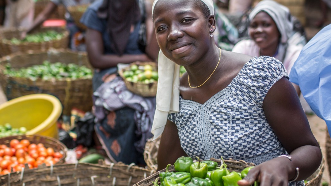 woman at a vegetable market