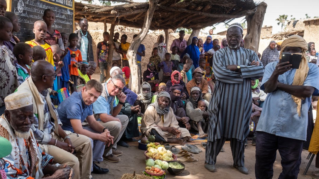 Mathias Mogge attending a village meeting in Lattakaf, Mali