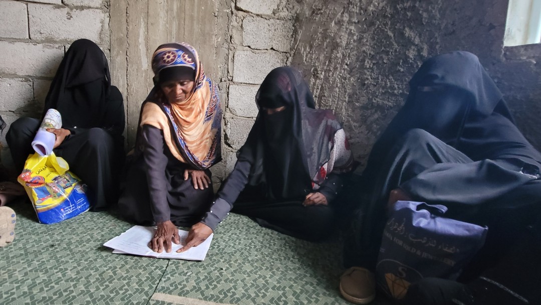 Aisha with her three daughters