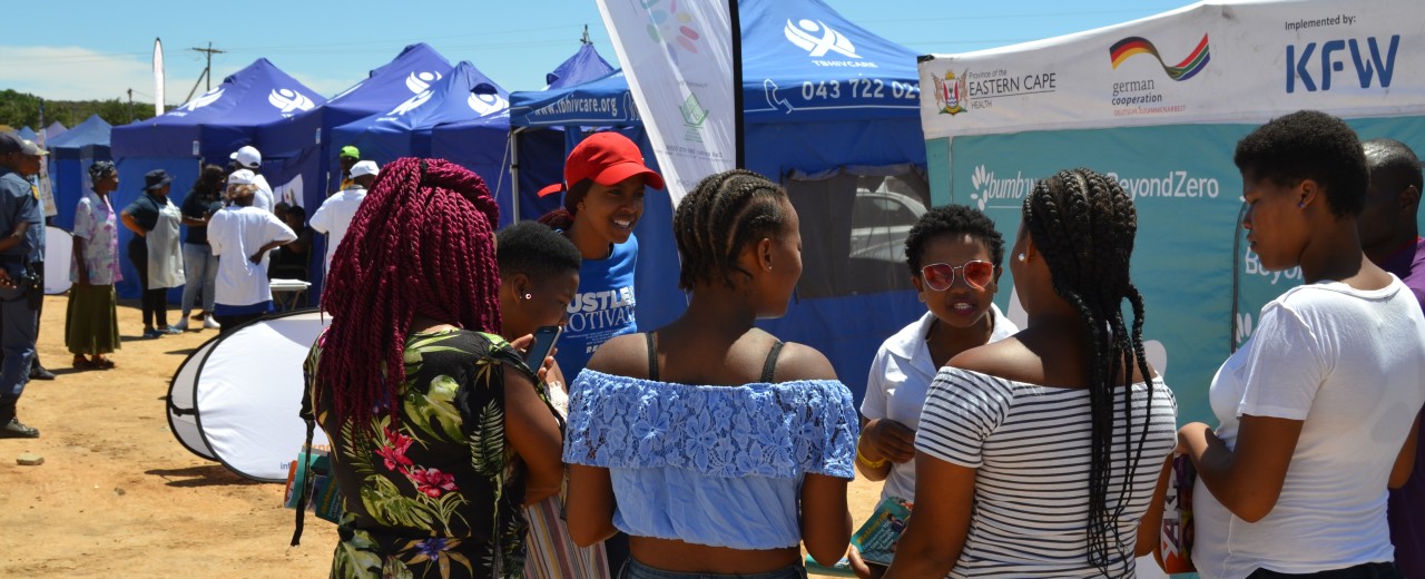 Group of young women talking to each other 