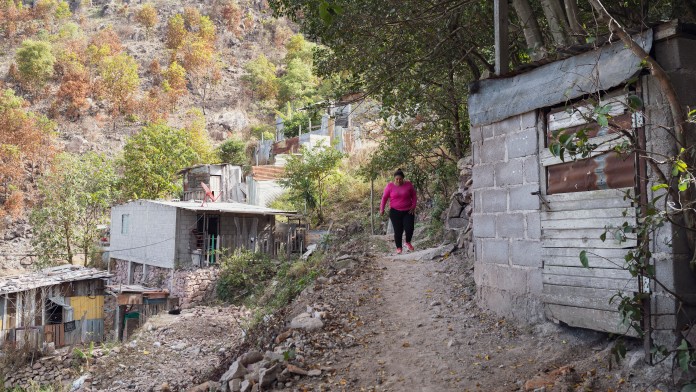 On the steep slopes of Tegucigalpa, flooding and landslides occur frequently due to extreme weather events.