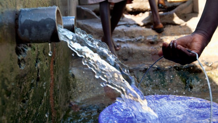 Water from wells flows into buckets