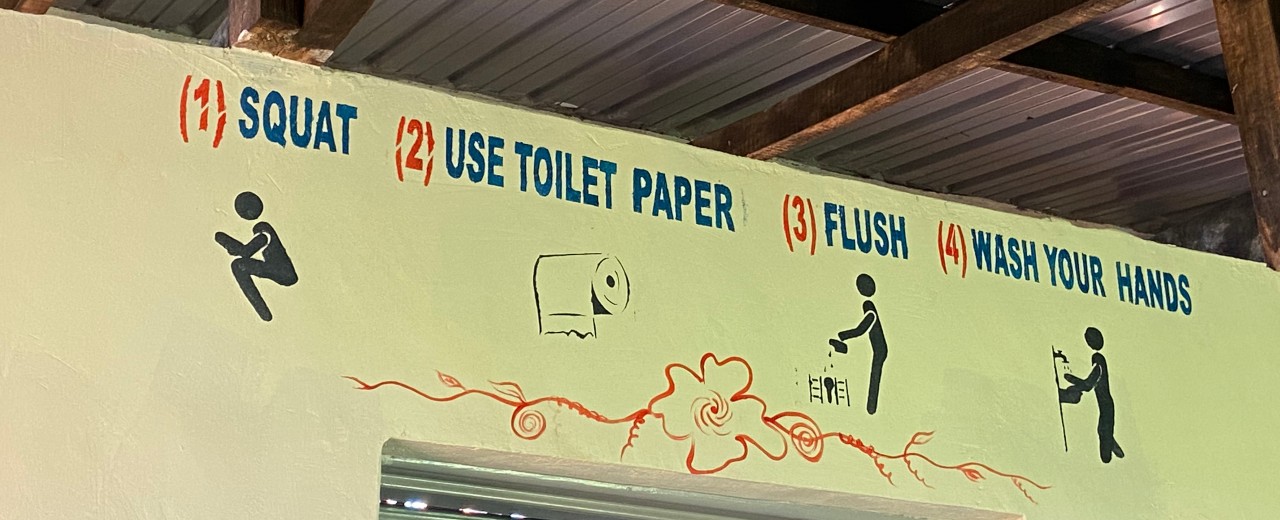 Instructions on hygiene measures in a public toilet