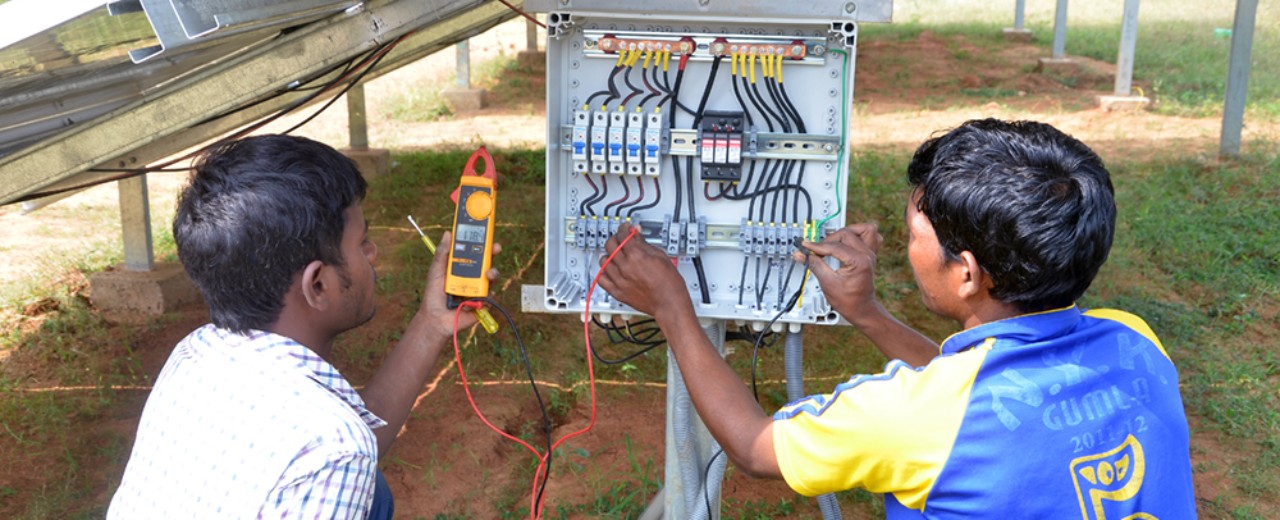 Men working on Solar Powered Mini Grids