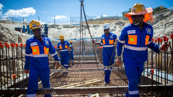 Workers at the construction site for the expansion of the Zandvleit wastewater treatment plant in Cape Town