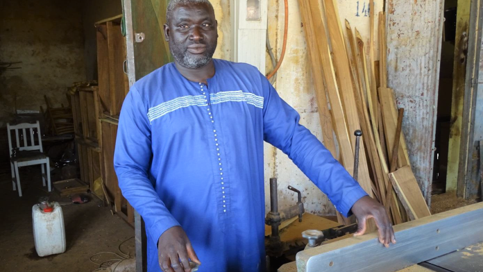 Man in his wood workshop