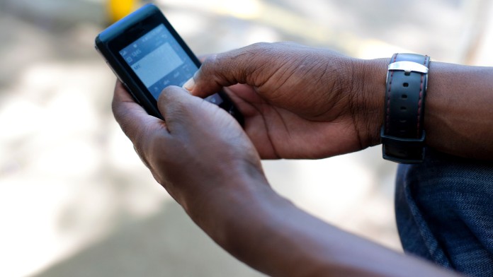 A person uses a smartphone 