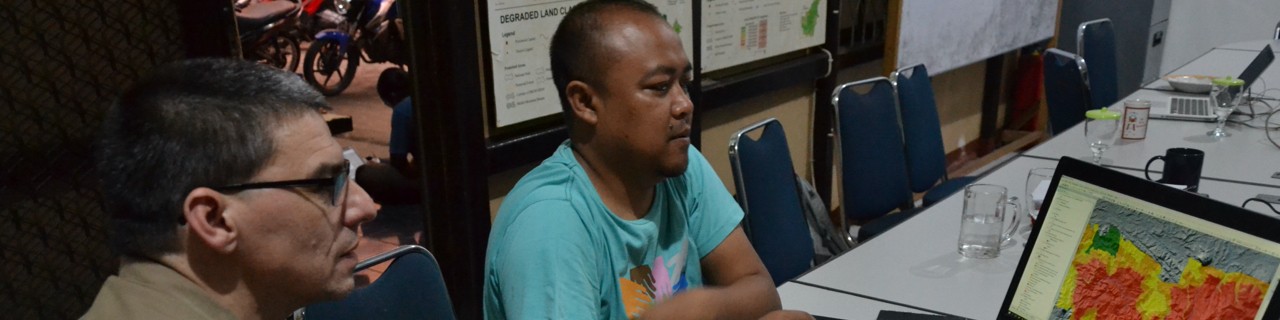 2 men work with geodata software