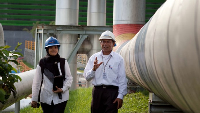 Employees during an inspection tour of a geothermal power plant